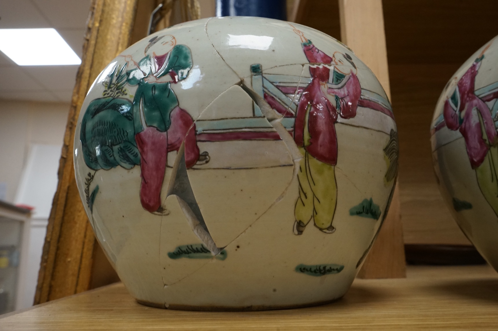 A pair of late 19th century Chinese famille rose jars, without covers, 19cm high.